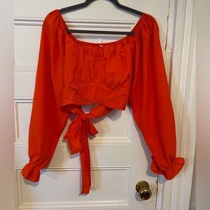 Orange off the shoulder, long sleeve peekaboo back crop top